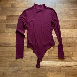 SO maroon thong turtleneck body suit